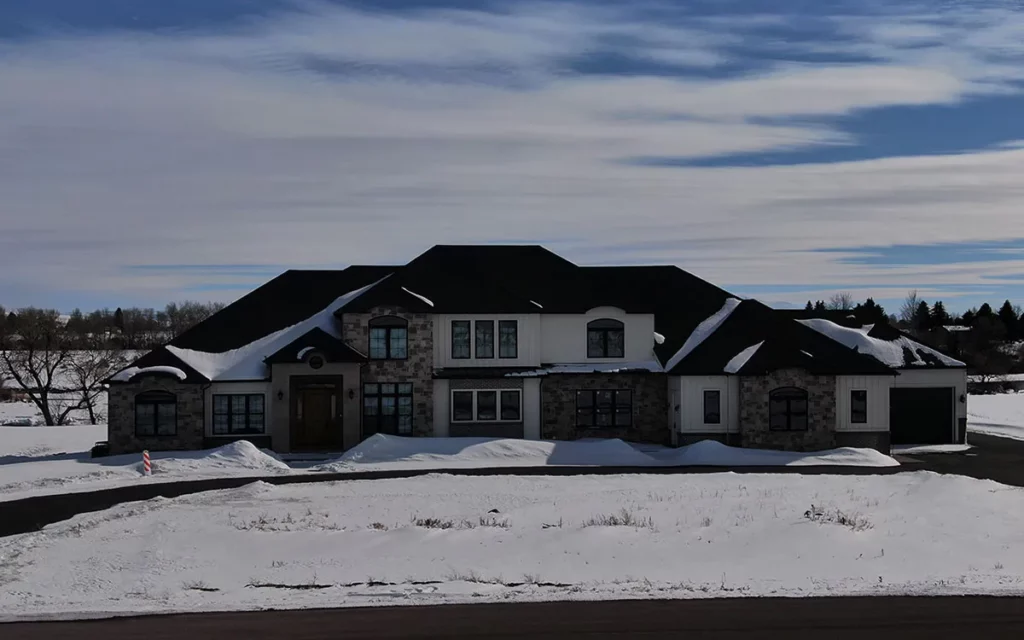 Home with a new roof from CCX Roofing a Logan, Utah roofing company.