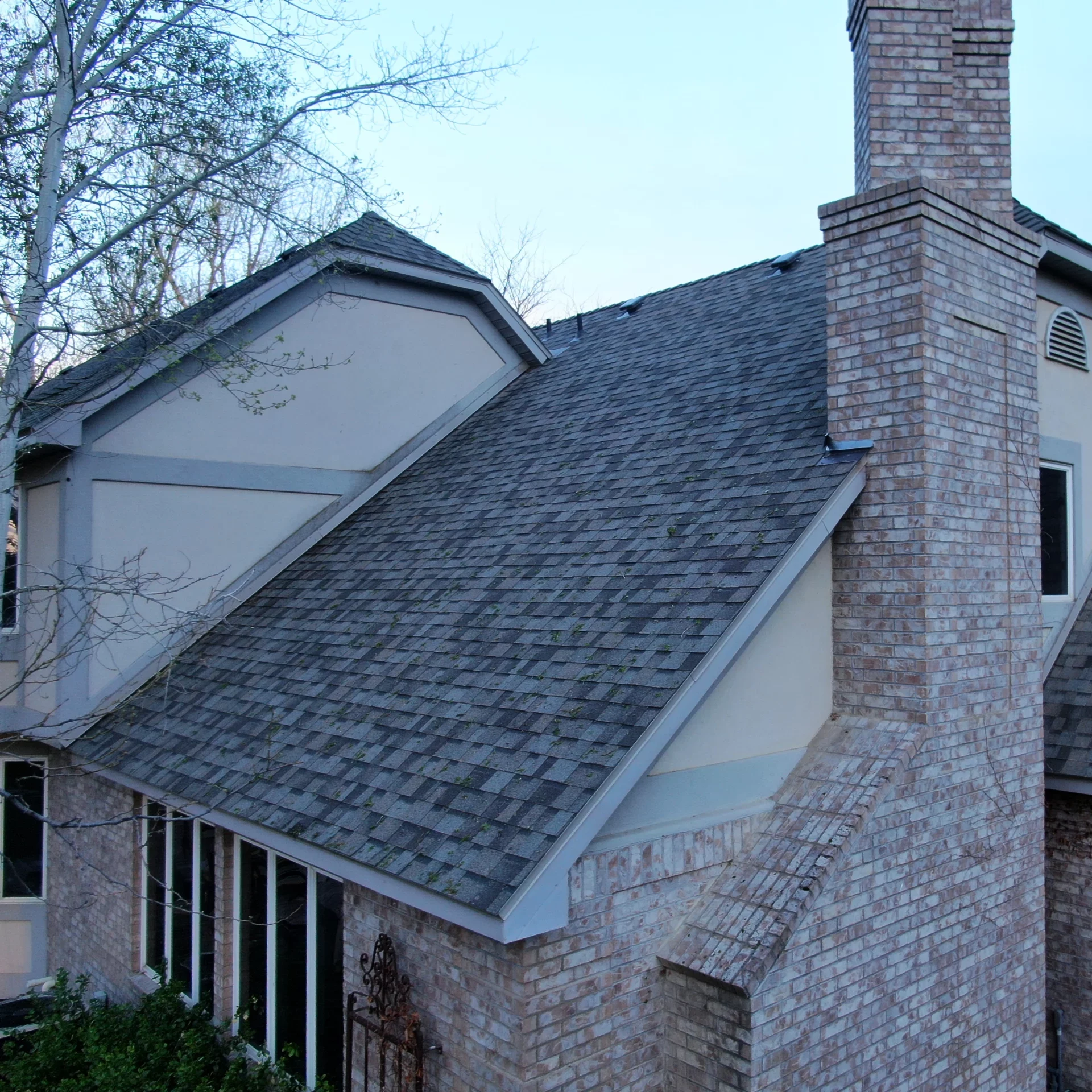 Residential Home with a Roof done by CCX Roofing